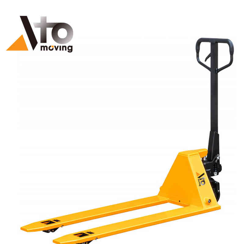 Bright yellow low profile pallet jack with black handle, designed for sliding under and lifting low-clearance pallets in a warehouse