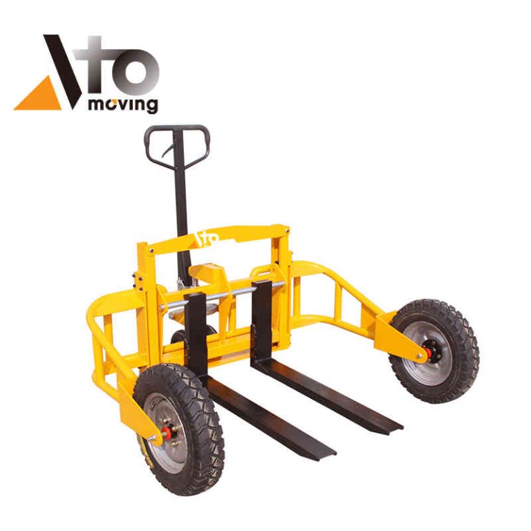 A rough terrain pallet truck with large, durable wheels and a hydraulic lift mechanism, designed for handling materials on uneven outdoor surfaces.